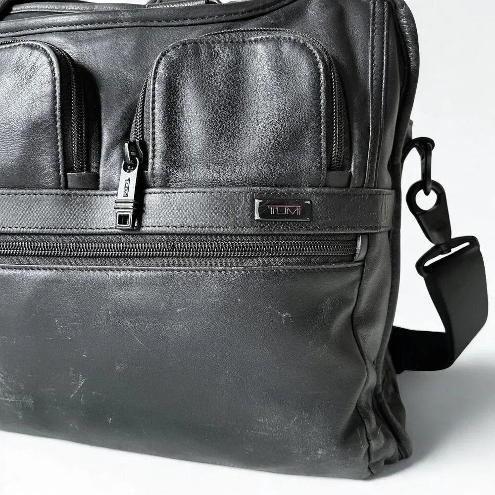TUMI Leather Laptop Briefcase Expandable Work Bag Black – Wear & Small Hole